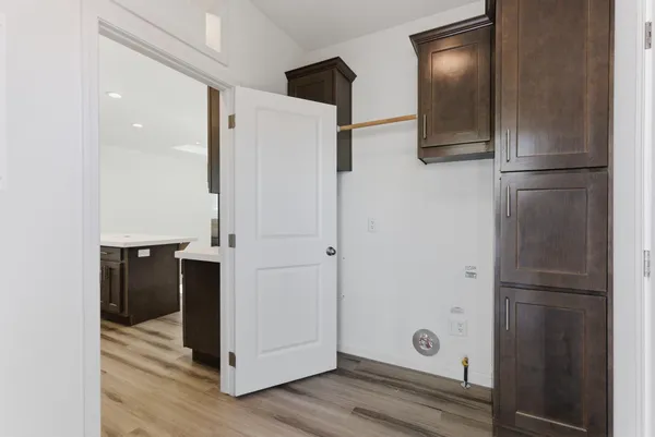 a bathroom with a double vanity sink and mirror