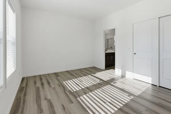 a view of wooden floor in an empty room