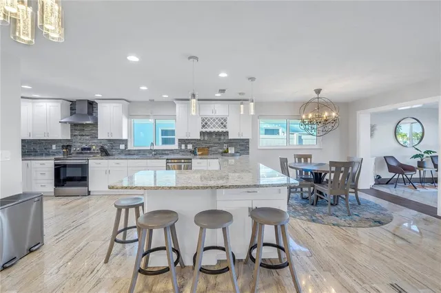 a view of a terrace with furniture and stove