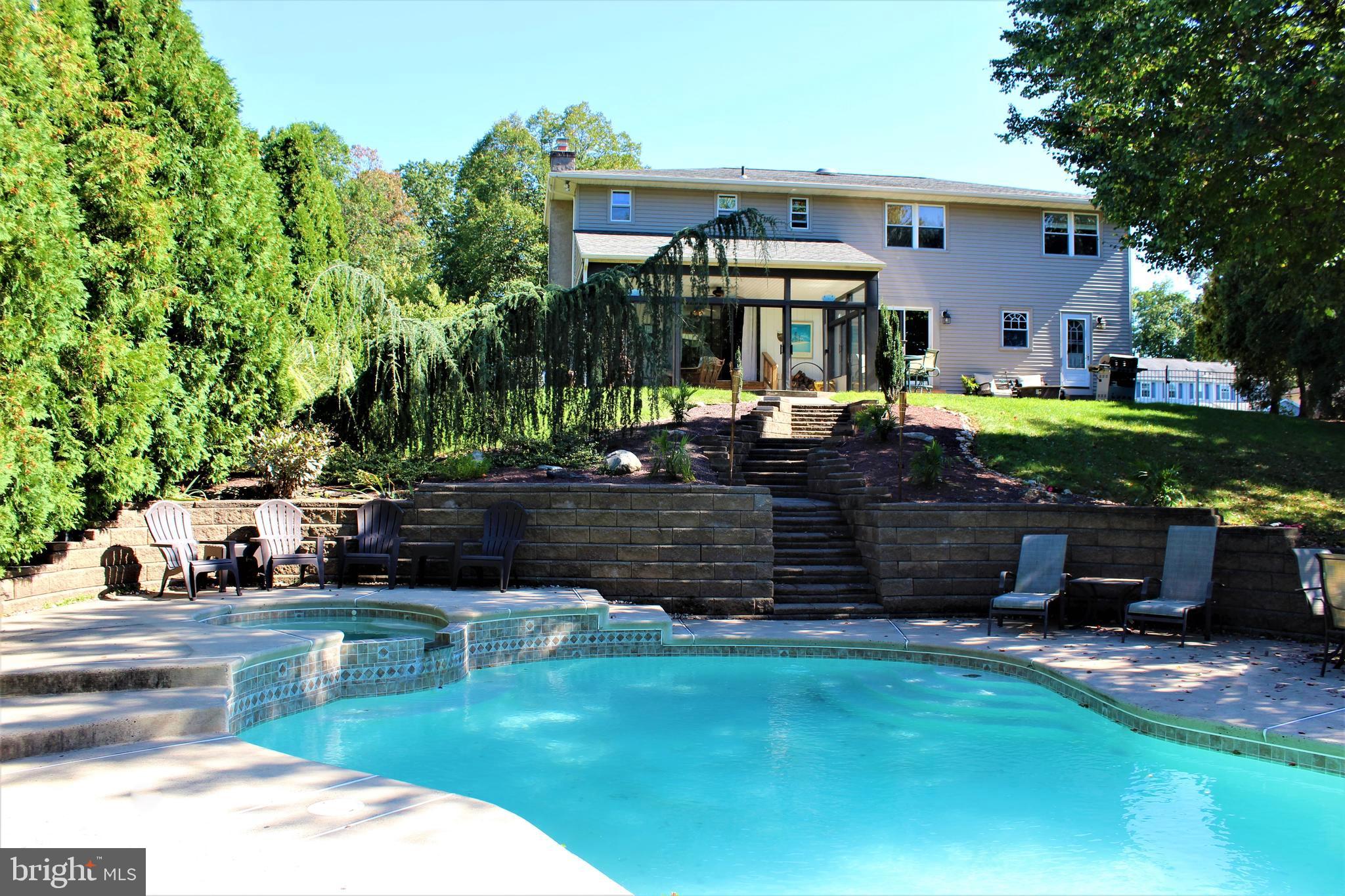 1340 Welsh Road Warrington, PA 18976 - Photo 19 of 32 PAVER WALL AND POOL