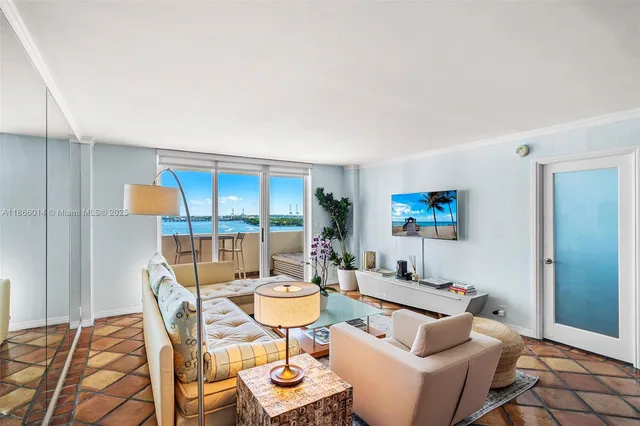 a living room with furniture and a table
