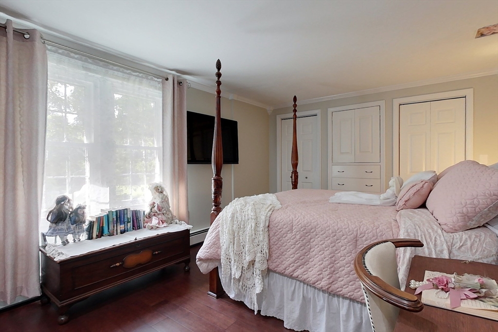 120 1/2 Lowell Road, Unit A Pepperell, MA 01463 - Photo 15 of 30 a bed room with a bed and a window