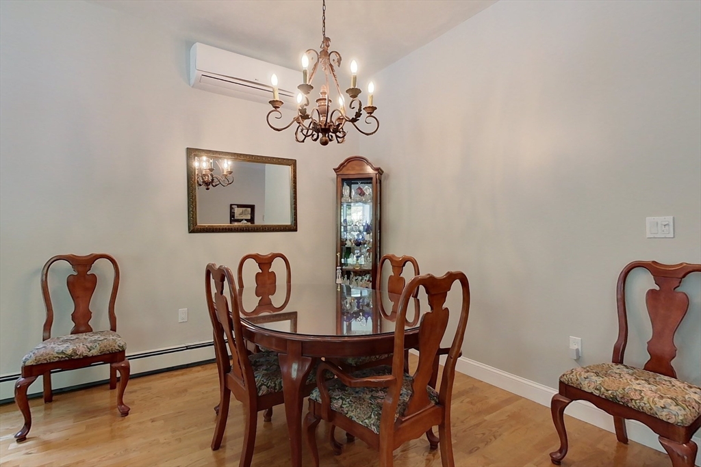 120 1/2 Lowell Road, Unit A Pepperell, MA 01463 - Photo 6 of 30 a dining room with furniture and window