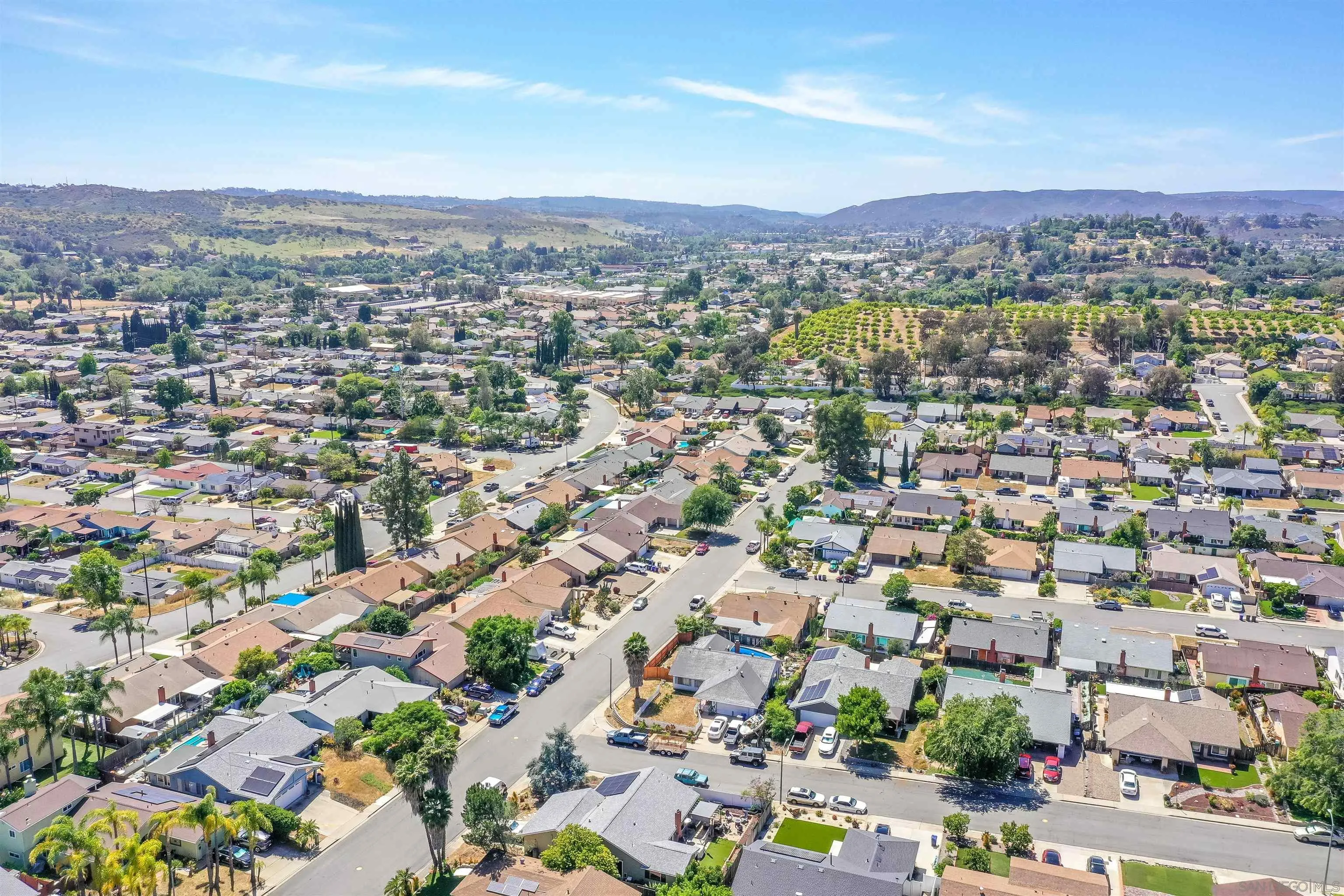 14513 Mirando Street Poway, CA 92064 - Photo 24 of 25 an aerial view of a city with lots of residential buildings