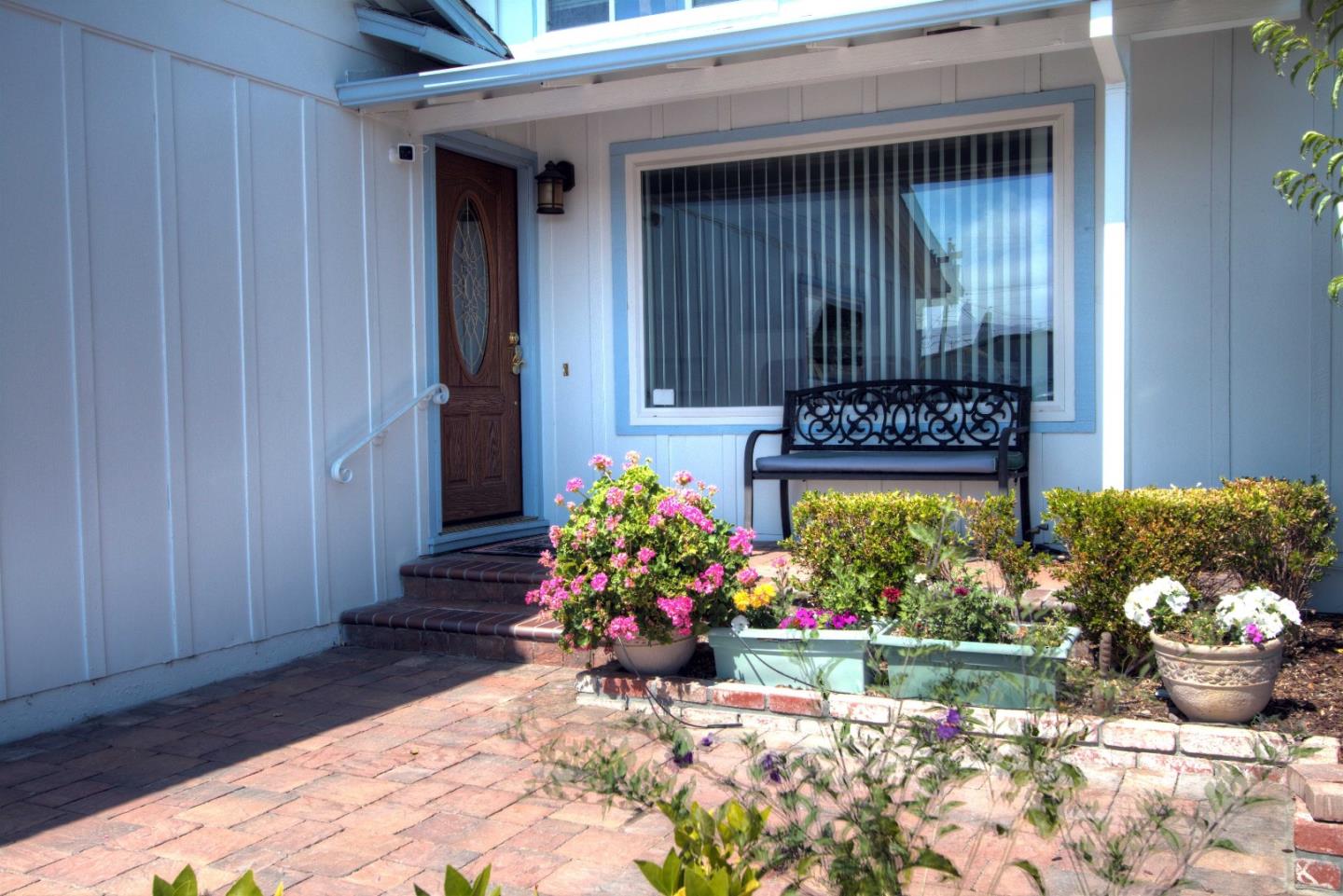 1614 Roberta Drive San Mateo, CA 94403 - Photo 2 of 6 a bunch of flowers in front of flowers