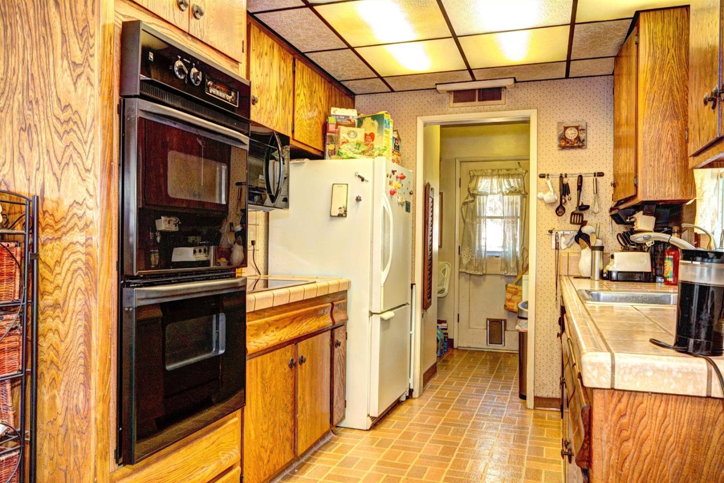1614 Roberta Drive San Mateo, CA 94403 - Photo 5 of 6 a view of a living room with a fireplace