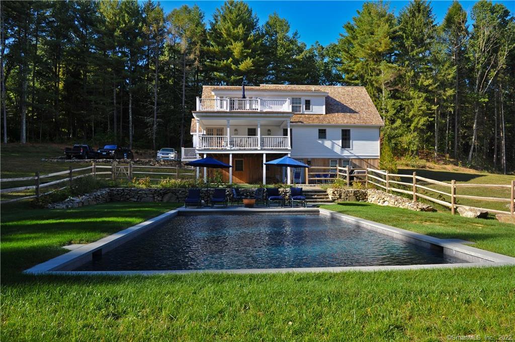 a view of a house with a swimming pool