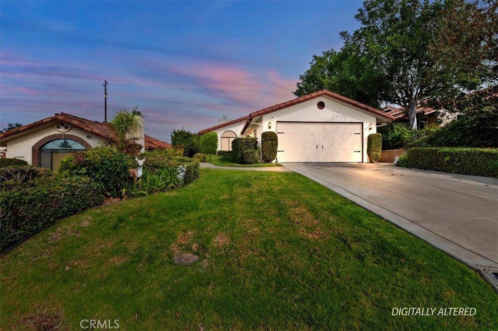 1168 North Crescent Ridge Road Fallbrook, CA 92028 - Photo 1 of 45 a front view of a house with a yard and garage