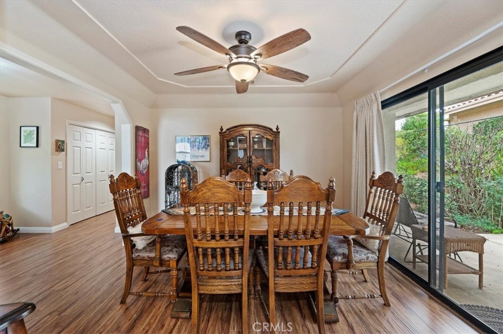 1168 North Crescent Ridge Road Fallbrook, CA 92028 - Photo 13 of 45 a view of a dining room with furniture window and wooden floor