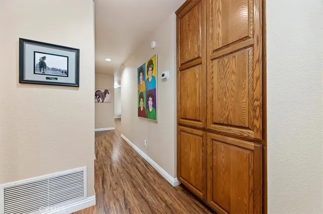 a room with furniture and wooden floor
