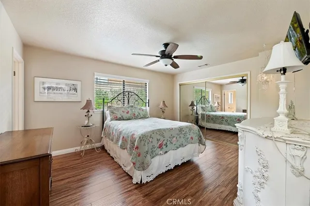 a bathroom with a sink double vanity granite and a mirror