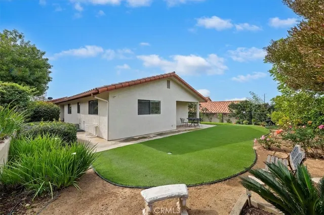 a backyard of a house with lots of green space