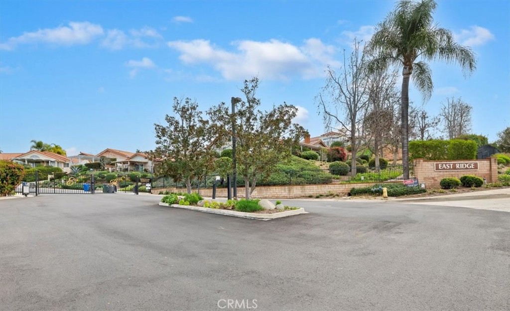 1168 North Crescent Ridge Road Fallbrook, CA 92028 - Photo 36 of 45 a view of a street with a yard
