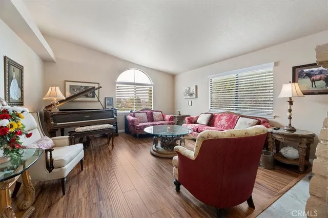 a living room with furniture and a table