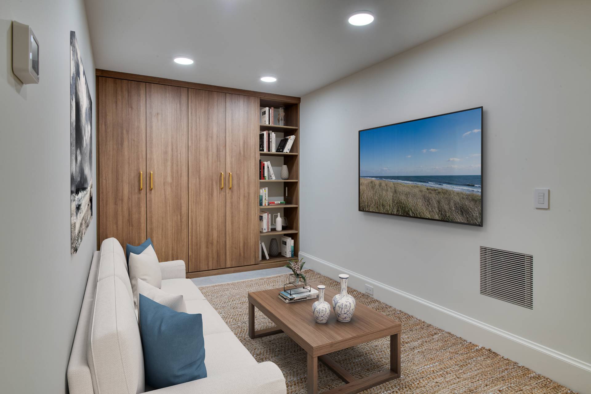 94 Cooper Lane East Hampton, NY 11937 - Photo 19 of 24 a living room with furniture and a flat screen tv