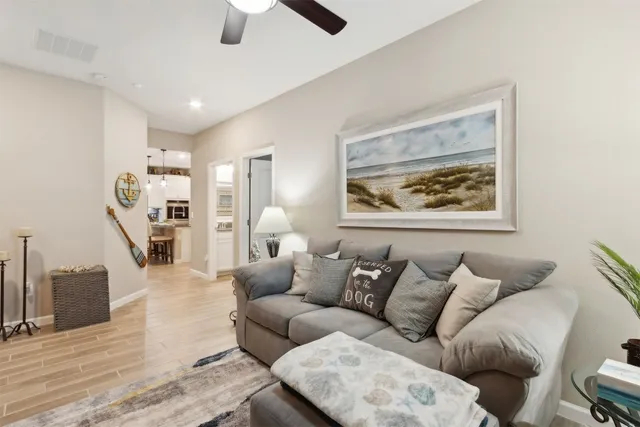 a bathroom with a sink a mirror and a shower
