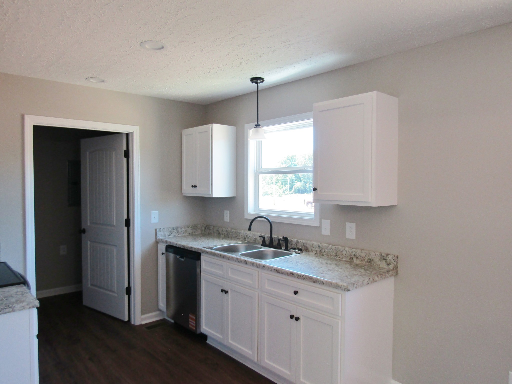 470 Crescent Factory Road Lawrenceburg, TN 38464 - Photo 8 of 15 a kitchen with sink cabinets and window