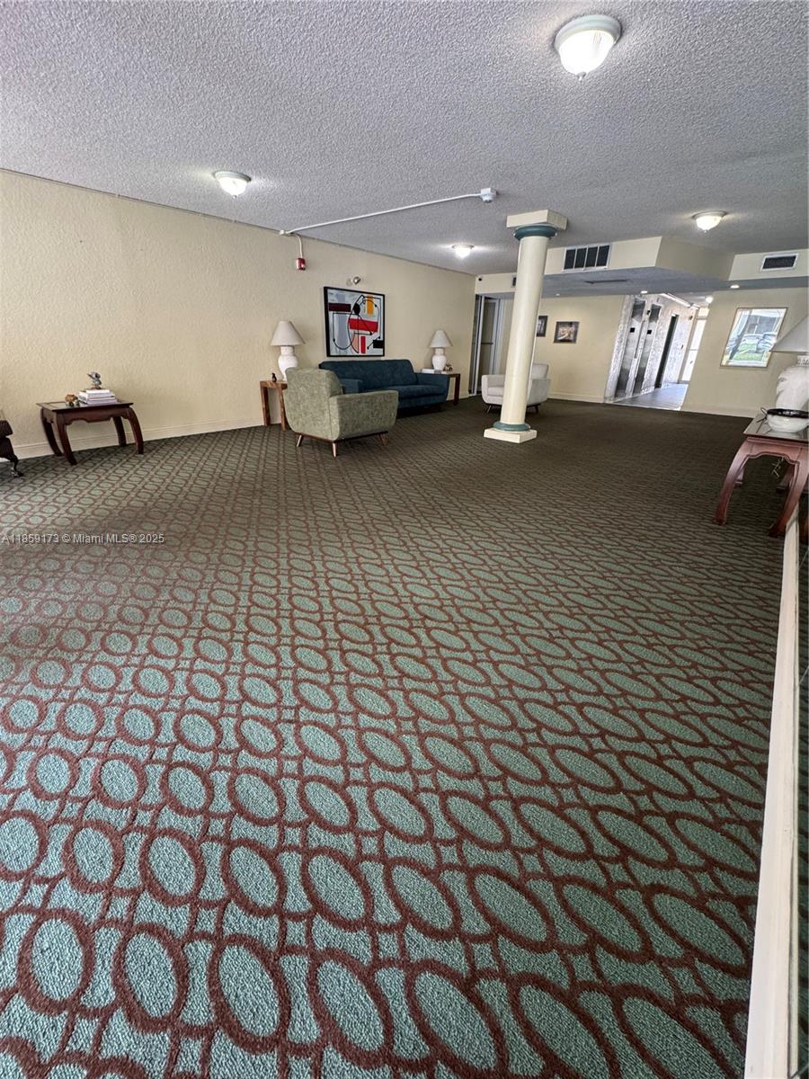 6841 Southwest 147th Avenue, Unit 1H Miami, FL 33193 - Photo 2 of 26 a living room with furniture