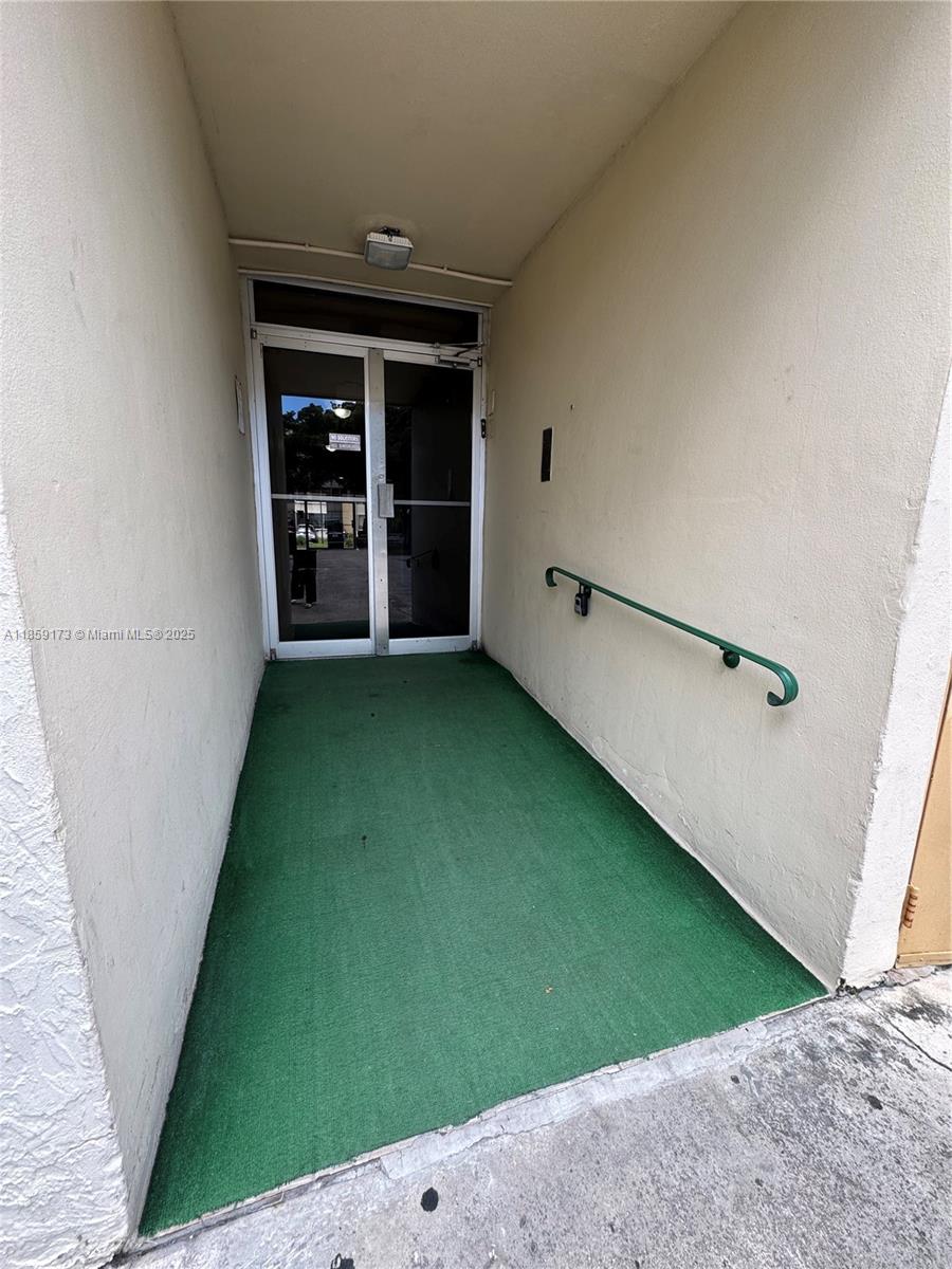 6841 Southwest 147th Avenue, Unit 1H Miami, FL 33193 - Photo 22 of 26 view of an empty room with closet