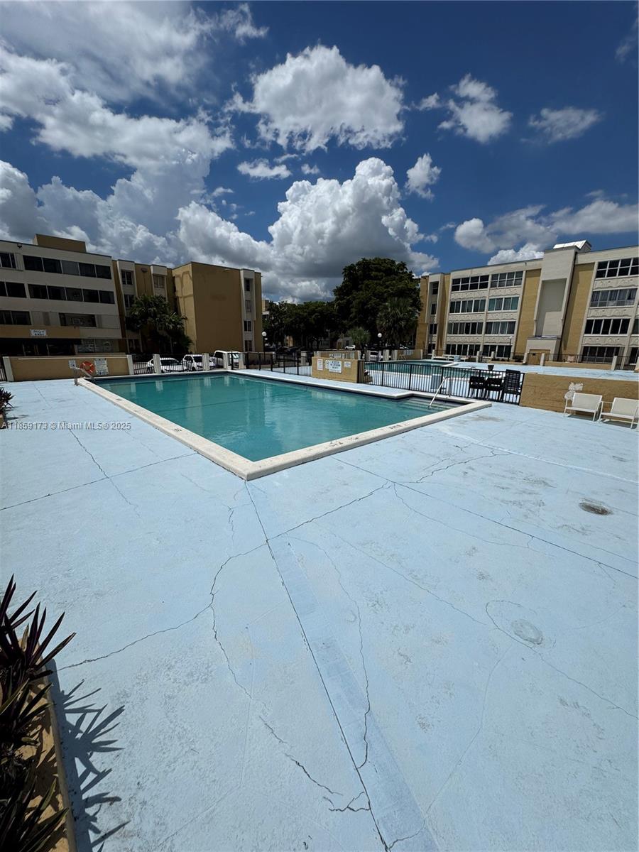 6841 Southwest 147th Avenue, Unit 1H Miami, FL 33193 - Photo 26 of 26 a view of building with outdoor space