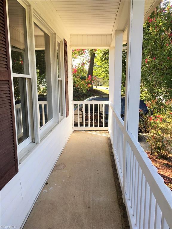 5905 High View Road Greensboro, NC 27410 - Photo 3 of 22 Rocking Chair Front porch with beautiful yard view.