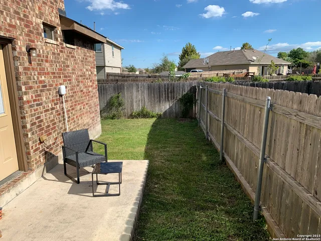 a view of a chairs on the roof deck