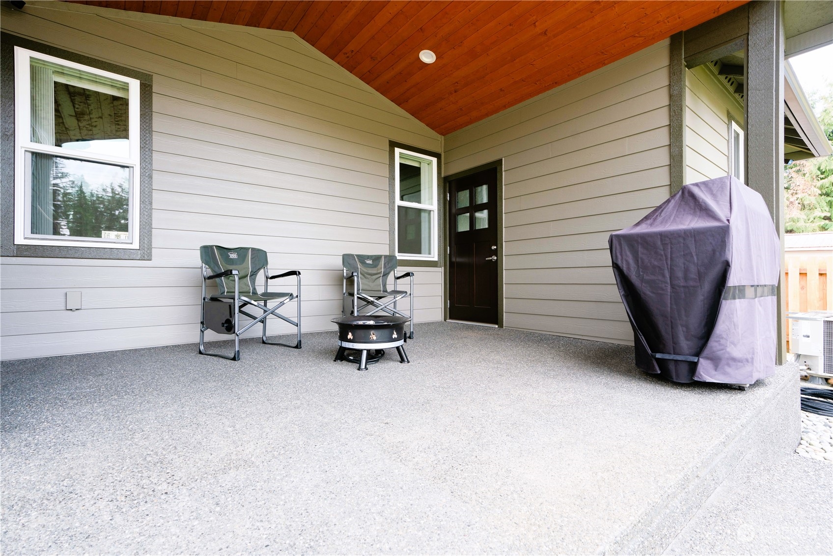 8487 Cimarron Way Maple Falls, WA 98266 - Photo 11 of 39 a view of an outdoor sitting area with brick walls