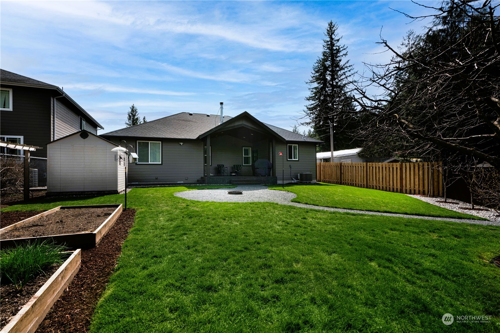 8487 Cimarron Way Maple Falls, WA 98266 - Photo 15 of 39 a front view of house with yard and green space