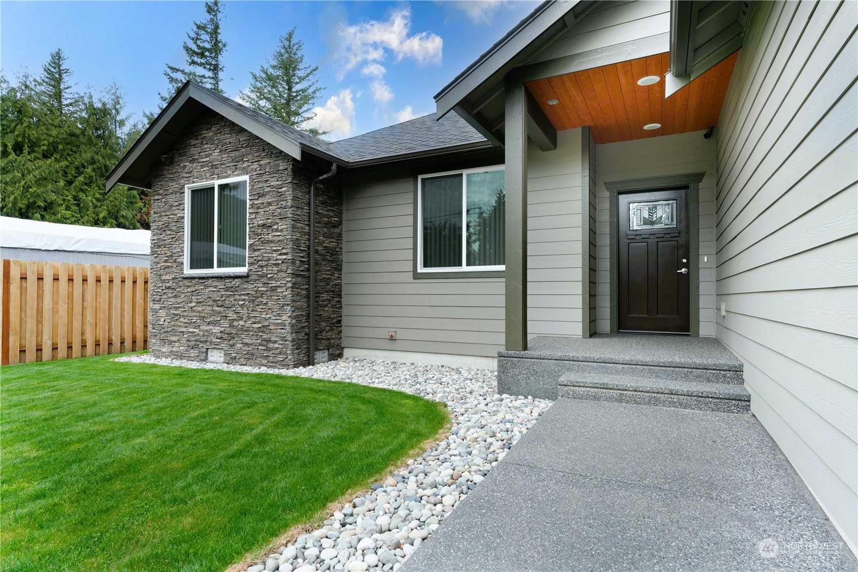 8487 Cimarron Way Maple Falls, WA 98266 - Photo 5 of 39 a front view of a house with a yard