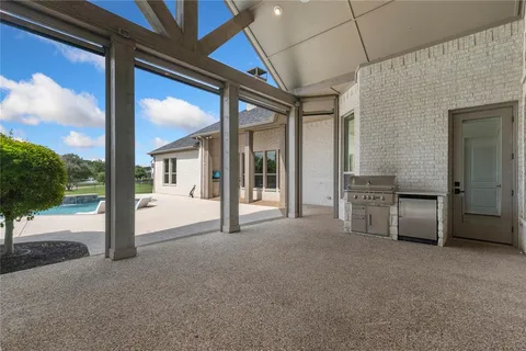a view of an empty room with a balcony