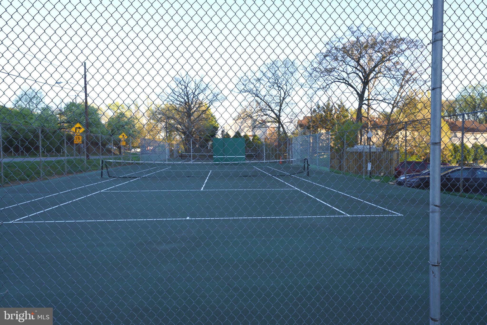 1111 University Boulevard West, Unit 1001A Silver Spring, MD 20902 - Photo 24 of 27 a view of a tennis court