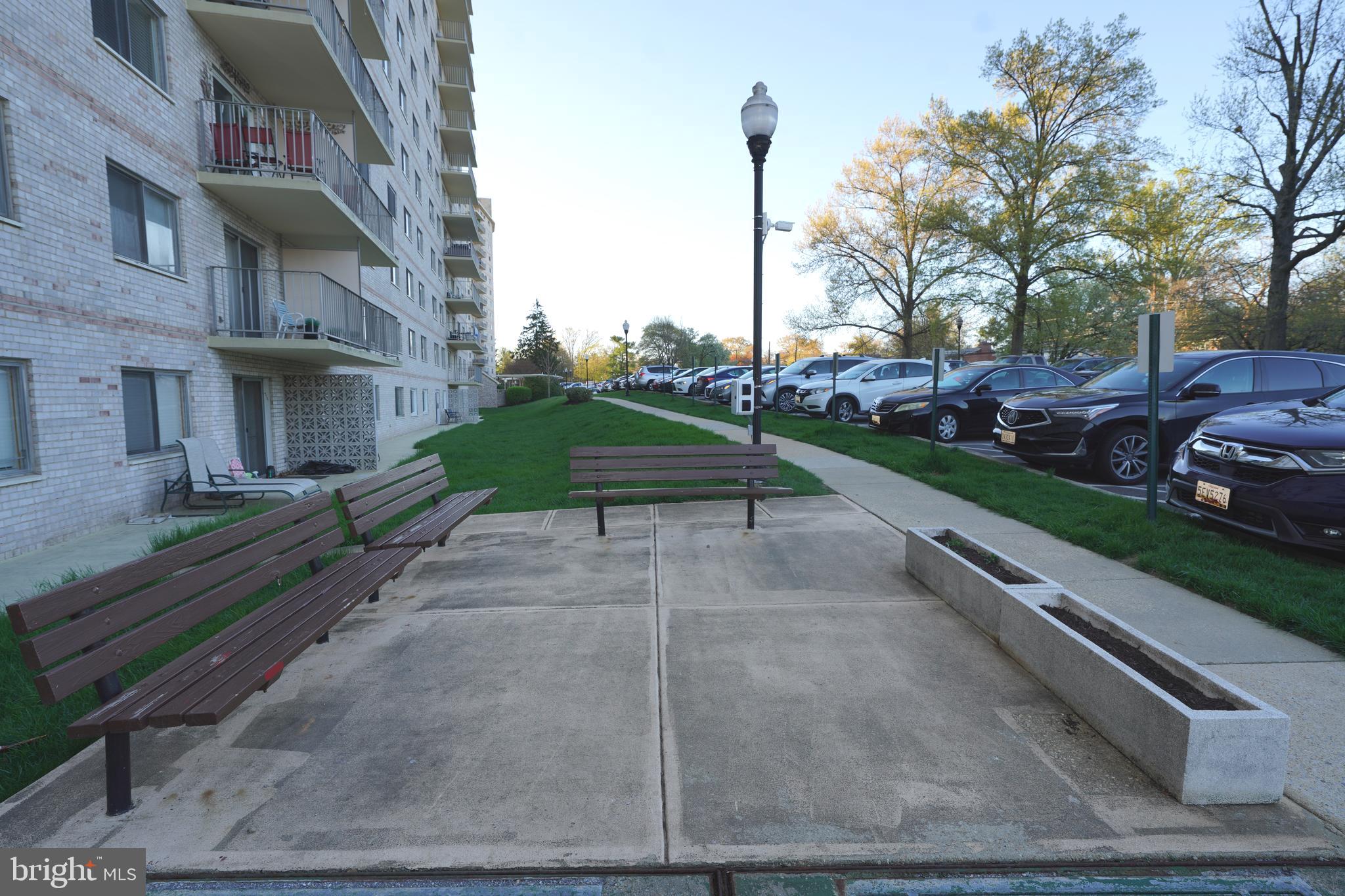 1111 University Boulevard West, Unit 1001A Silver Spring, MD 20902 - Photo 25 of 27 a view of a street with houses on the side