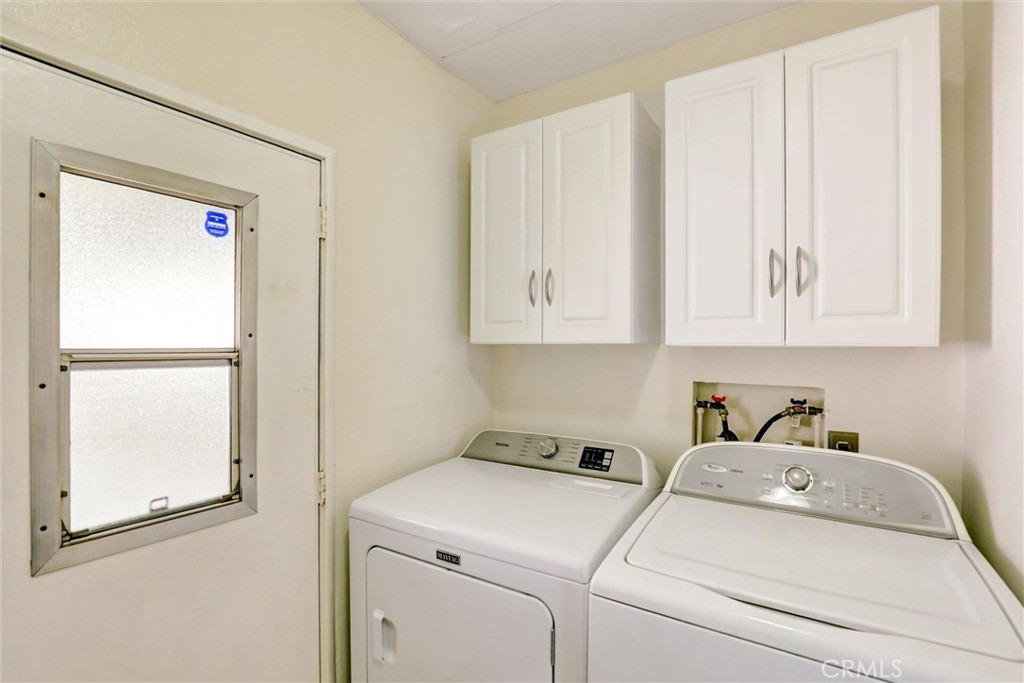 7700 Lampson Avenue, Unit 71 Garden Grove, CA 92841 - Photo 18 of 24 a utility room with dryer and washer