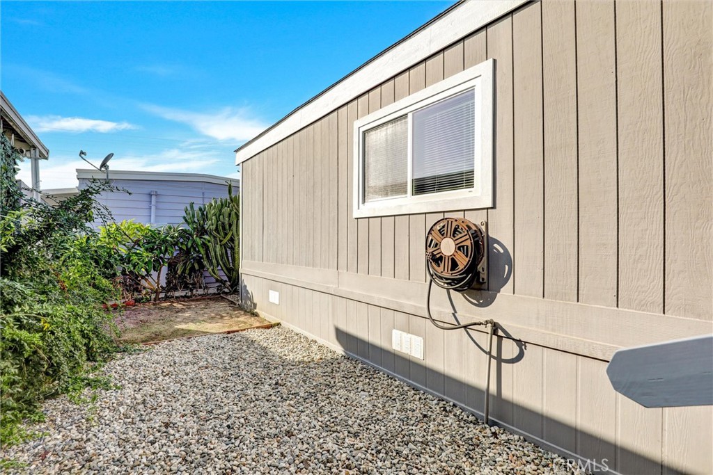 7700 Lampson Avenue, Unit 71 Garden Grove, CA 92841 - Photo 20 of 24 a front view of a house