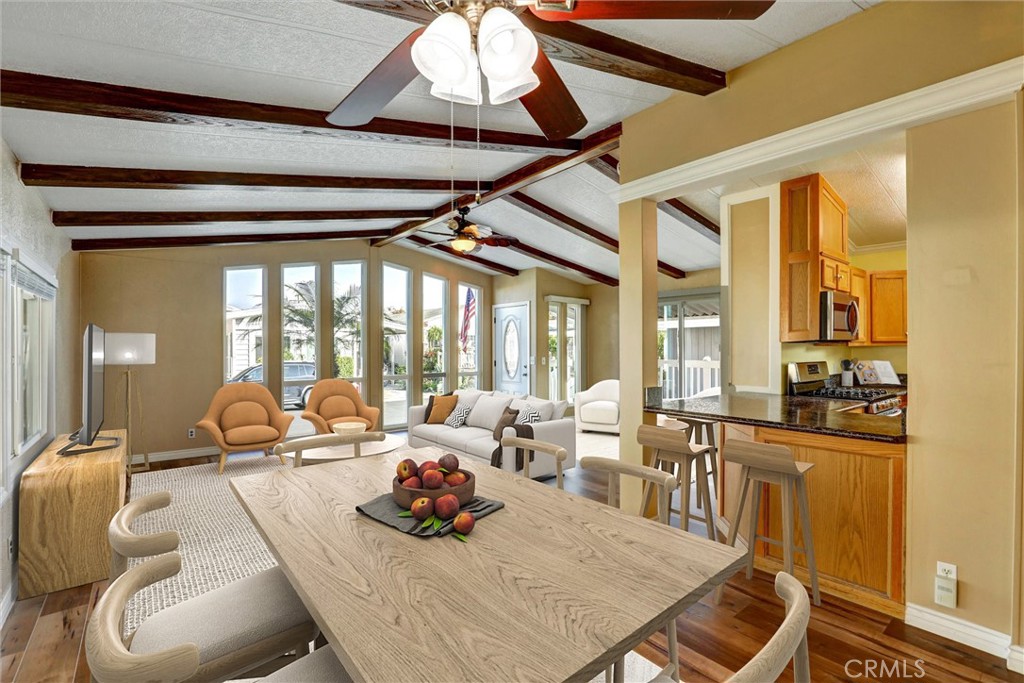 7700 Lampson Avenue, Unit 71 Garden Grove, CA 92841 - Photo 6 of 24 a room with furniture and large windows