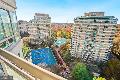 a view of a balcony with city view