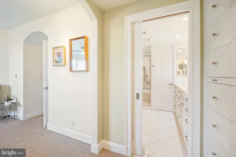 a view of a bathroom with a glass door shower
