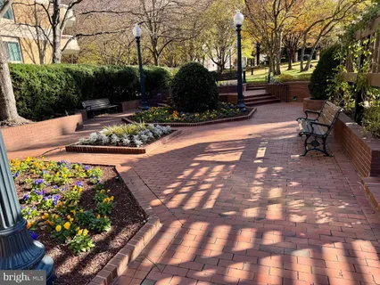 a view of a backyard with sitting area