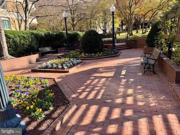 a view of a backyard with sitting area