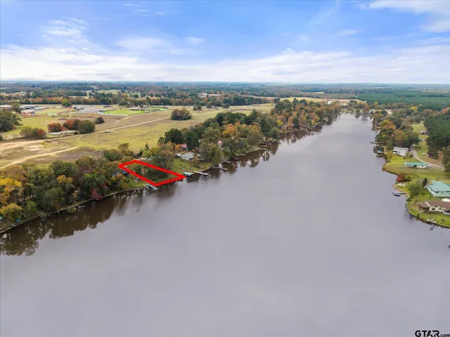 a view of a lake with a city