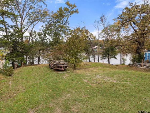 a view of street with parked cars