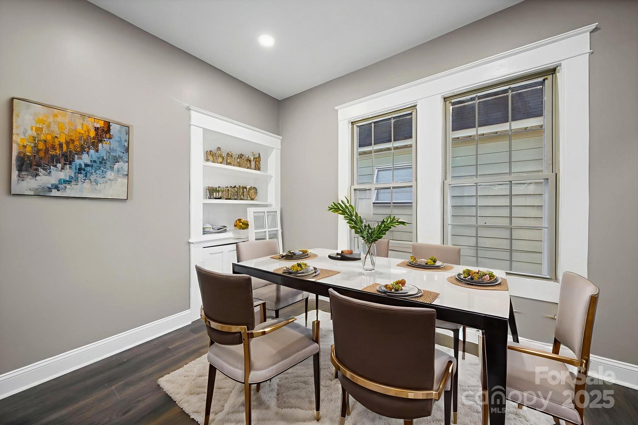 113 7th Street Spencer, NC 28159 - Photo 29 of 44 a view of a dining room with furniture window and wooden floor