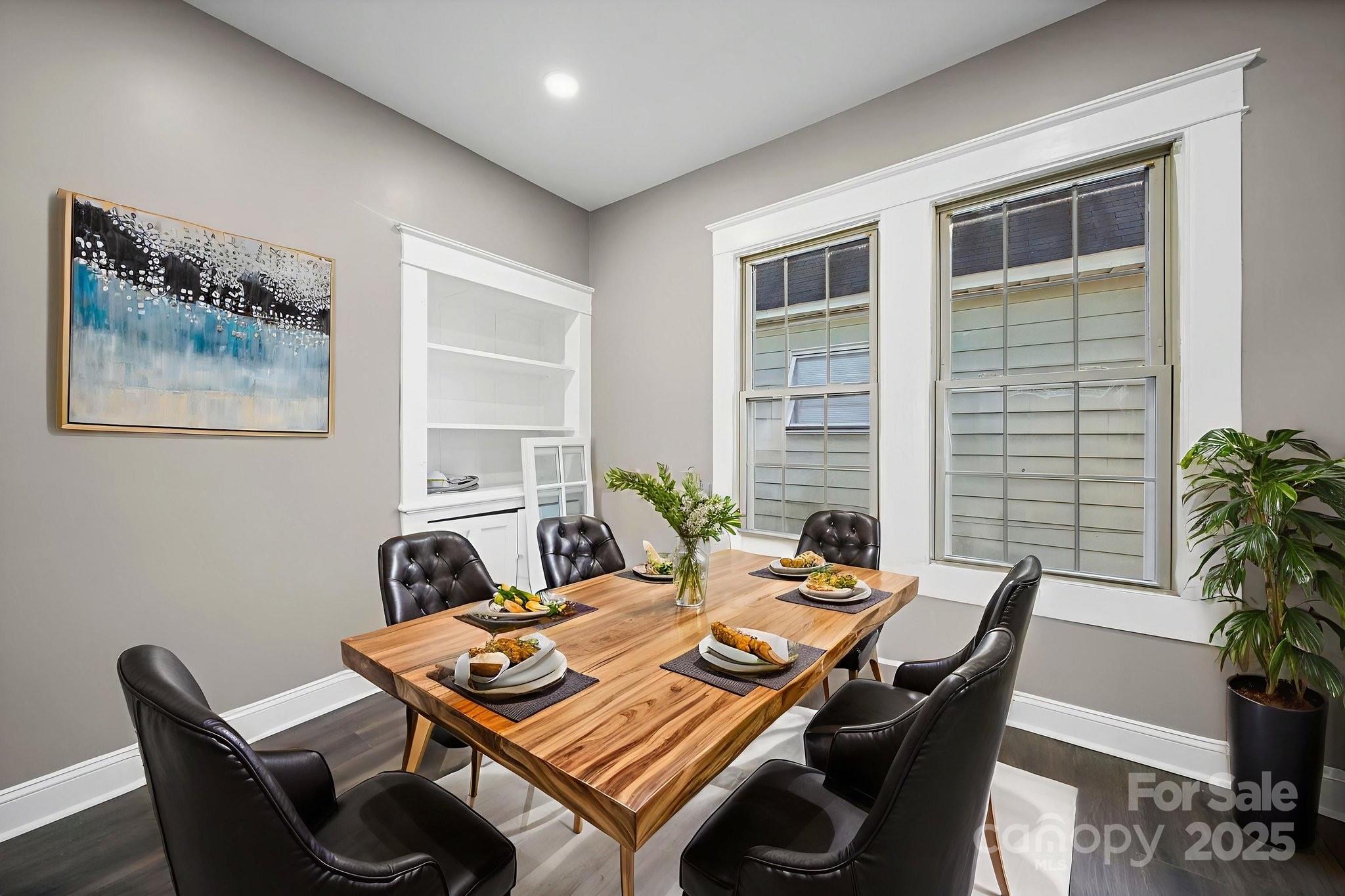 113 7th Street Spencer, NC 28159 - Photo 34 of 44 a view of a dining room with furniture window and wooden floor