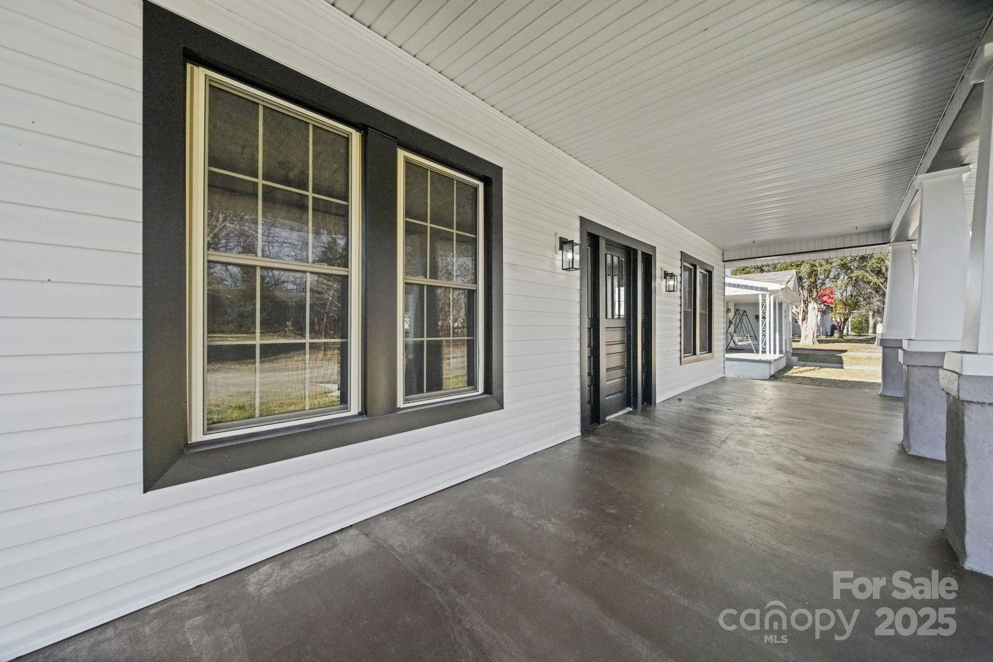 113 7th Street Spencer, NC 28159 - Photo 35 of 44 a view of an entryway with wooden floor