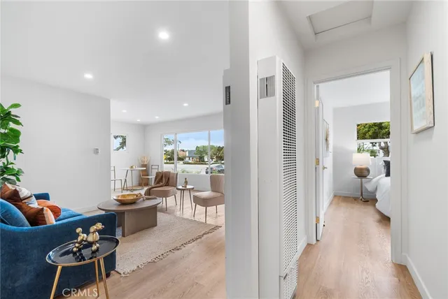 a view of a living room and dining room