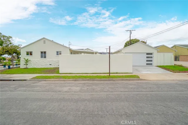 a view of house with a swimming pool