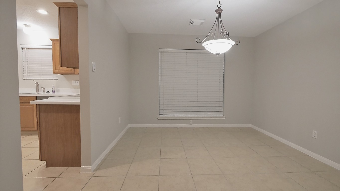 1335 Hidden Canyon Road Katy, TX 77450 - Photo 8 of 24 Dining Room attached to the Kitchen