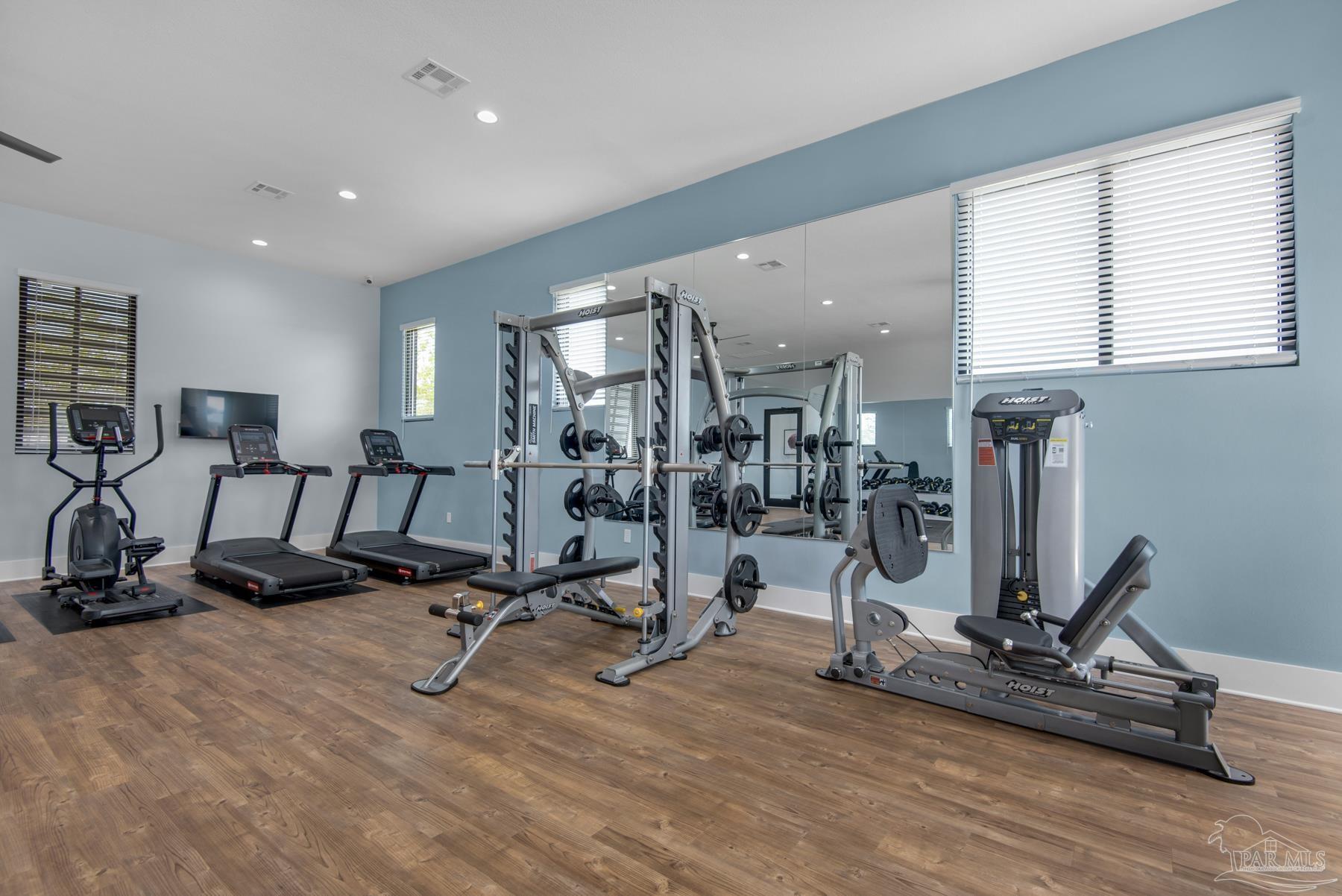 4671 Eider Road Pace, FL 32571 - Photo 29 of 37 a view of a room with gym equipment