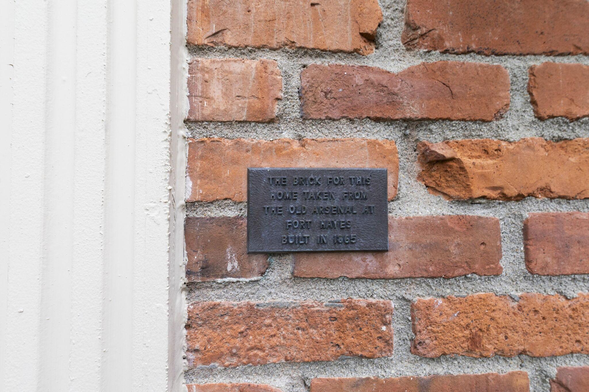 2111 Cheltenham Road Columbus, OH 43220 - Photo 4 of 64 Plaque states “ The brick from this home taken from The Old Arsenal at Fort Hayes built in 1865.