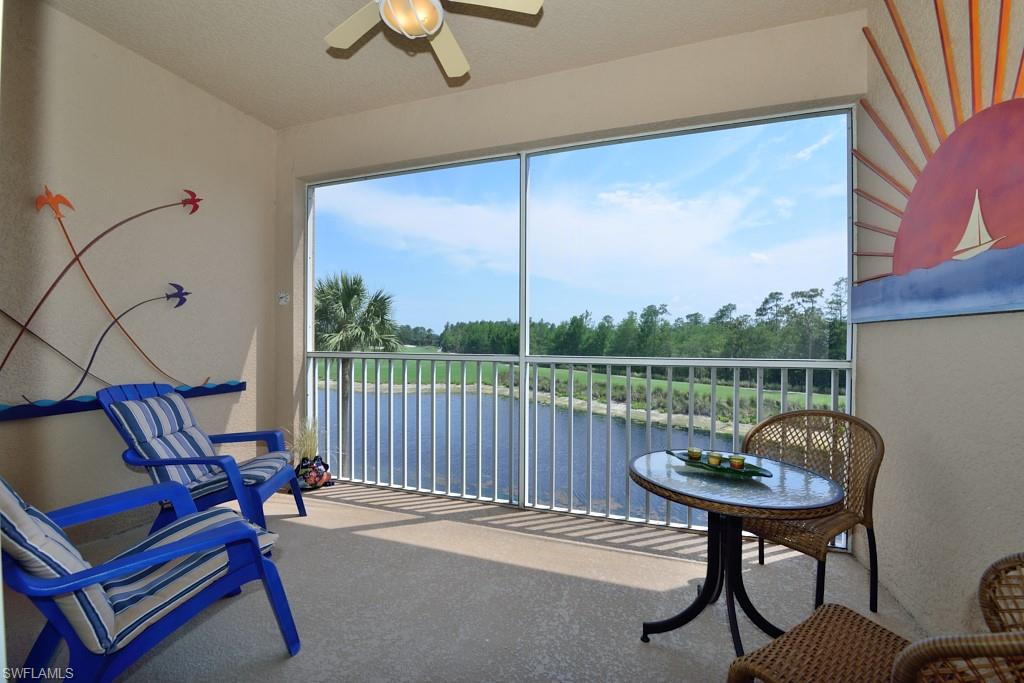 3830 Sawgrass Way, Unit 2934 Naples, FL 34112 - Photo 2 of 16 a view of a balcony and chairs
